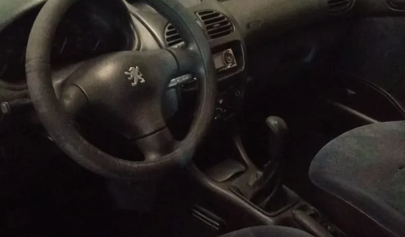 
								PEUGEOT 206 1.9 XTD lleno									